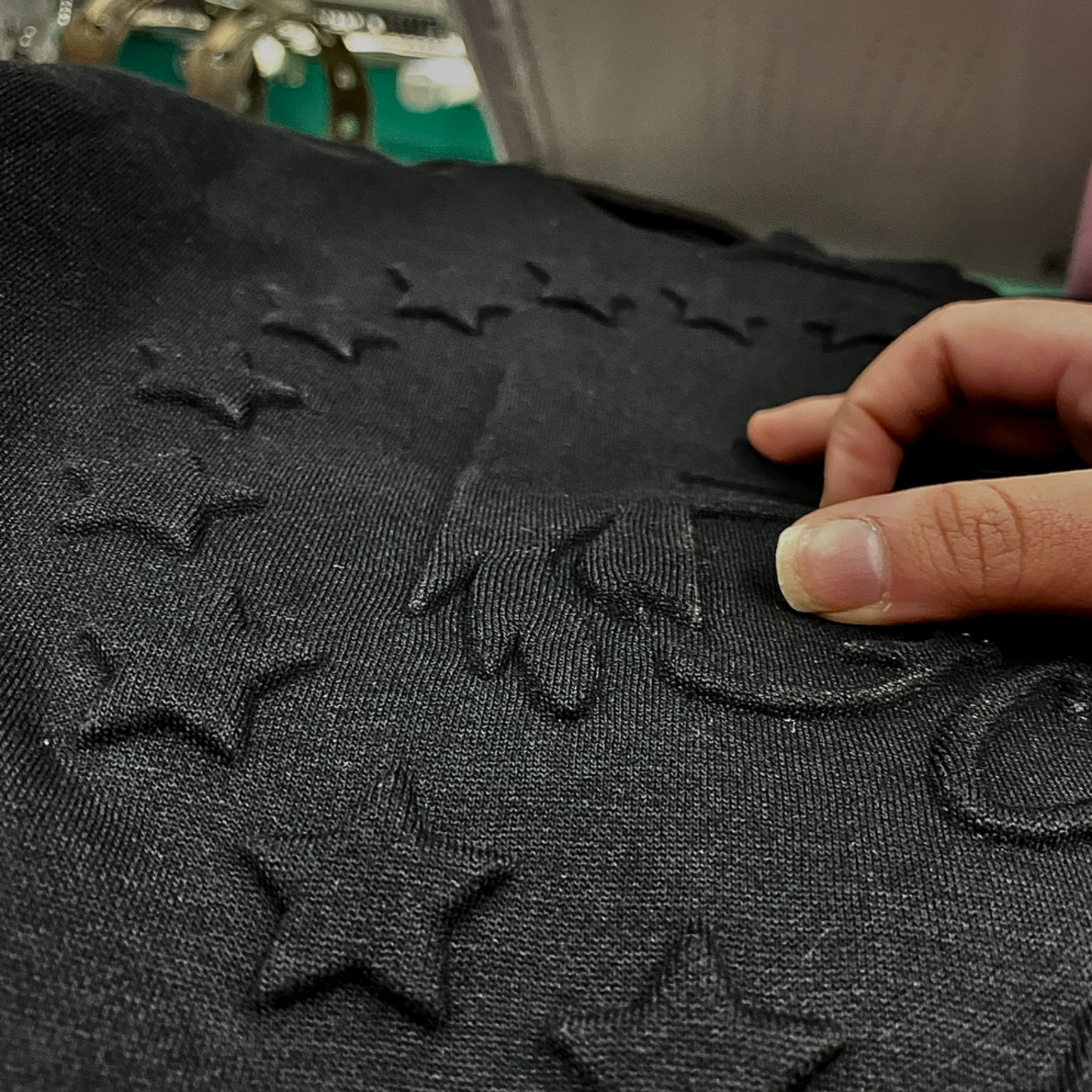 Engraving your logo onto sweatshirts, hoodies, t-shirts and more -BRANDURNAME.COM